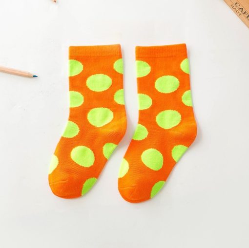 Lasten sukat pallokuvioiset oranssit